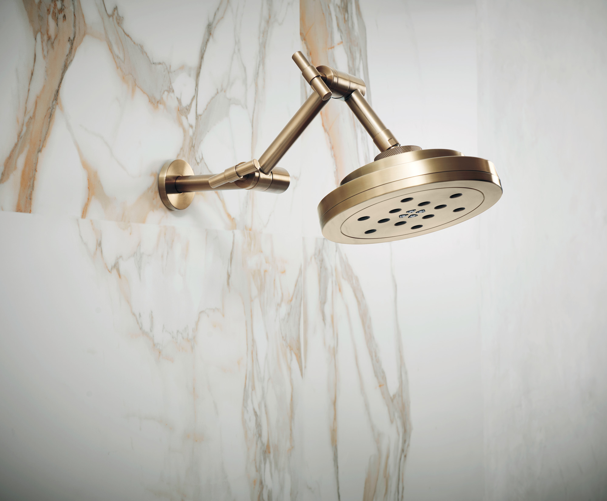 Essential™ Shower Series | Linear Round Jointed Wall Mount Shower